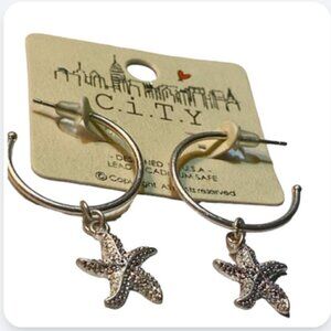 City silver hoop earrings with starfish charm dangles